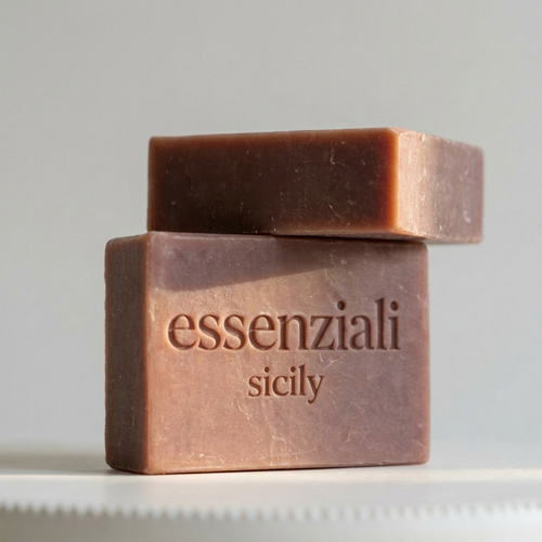 Essenziali Sicily soap bars on a light background.