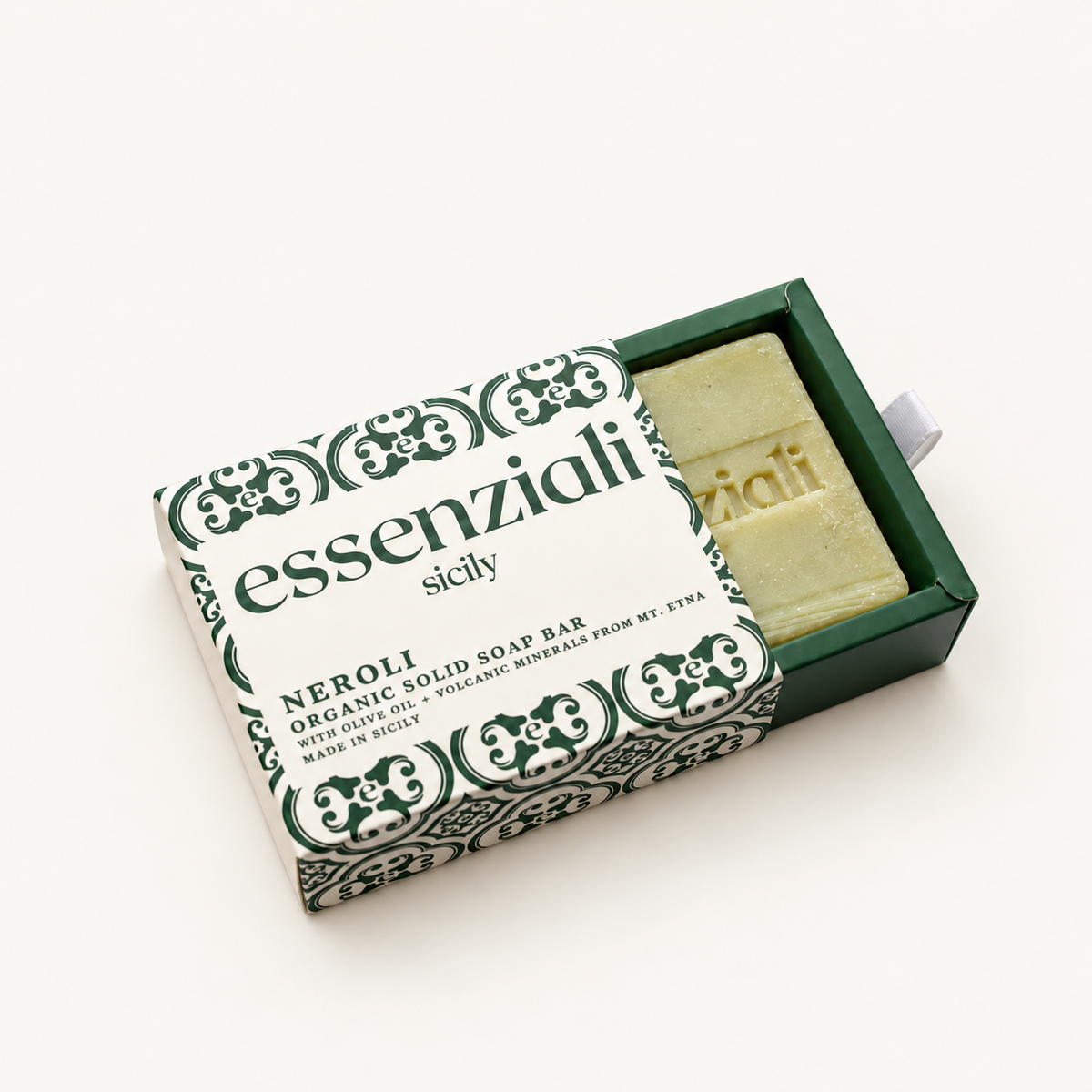 Essenziali Neroli soap in its partly opened patterned box on a cream background